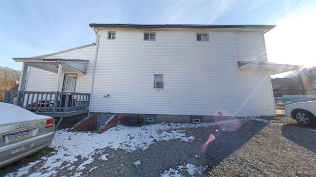 view of snow covered property