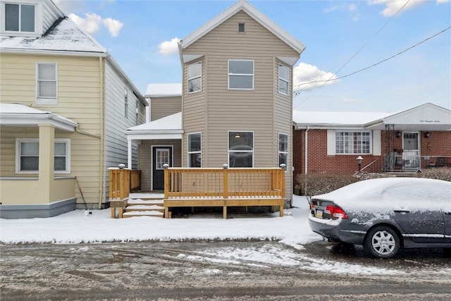 view of front property with a wooden deck