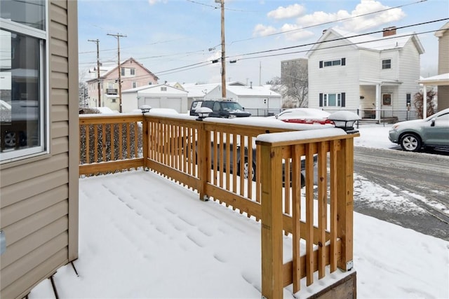 view of snow covered deck