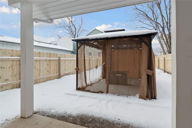 view of yard covered in snow