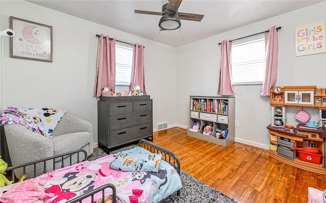 bedroom featuring ceiling fan and wood-type flooring