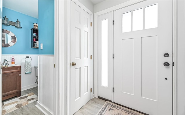 foyer entrance featuring light hardwood / wood-style floors