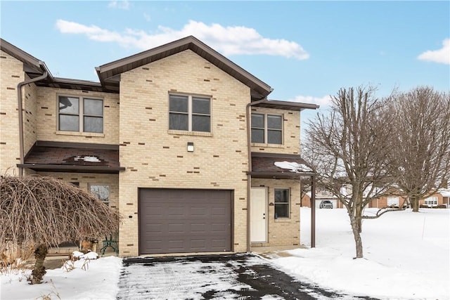 front facade with a garage