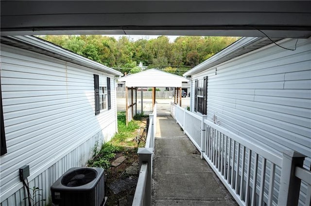 view of side of home featuring central air condition unit