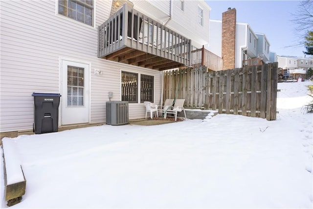 exterior space with a balcony and central AC