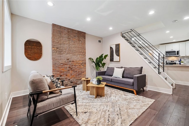 living room with dark hardwood / wood-style floors