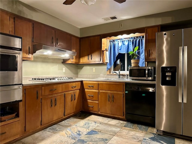 kitchen with ceiling fan, sink, and appliances with stainless steel finishes