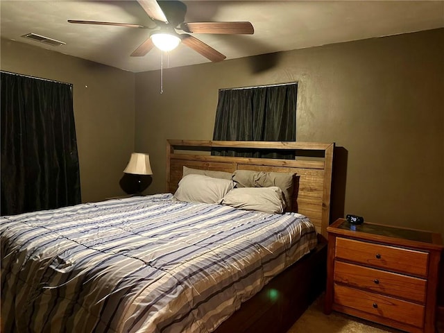 bedroom featuring ceiling fan and carpet floors