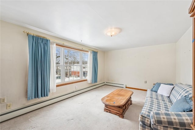 sitting room with carpet floors and a baseboard heating unit