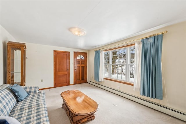 living room with a baseboard radiator and light colored carpet