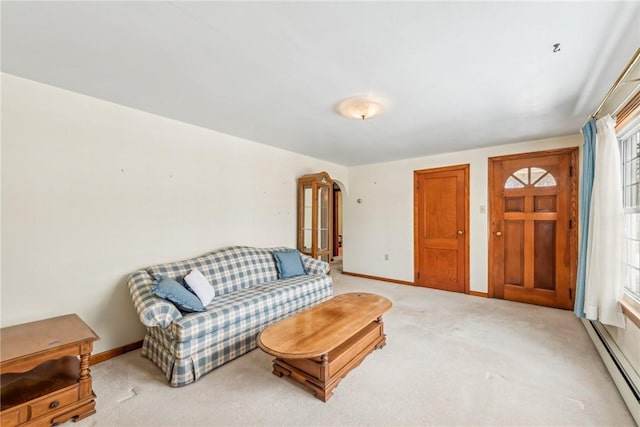 living room with carpet and a baseboard radiator