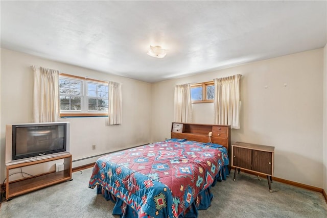 bedroom featuring carpet and a baseboard radiator