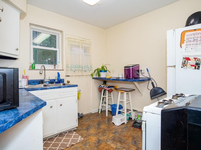 laundry area with sink