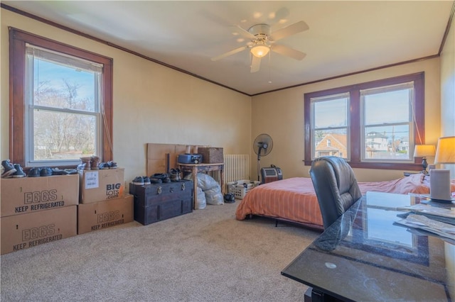 bedroom featuring carpet flooring, ceiling fan, and ornamental molding