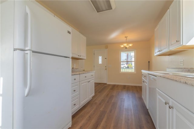 kitchen featuring white cabinetry, dark hardwood / wood-style flooring, a chandelier, decorative light fixtures, and white appliances