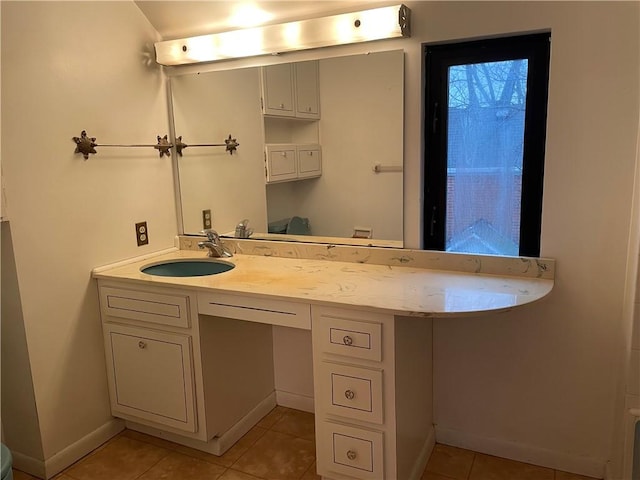 bathroom with vanity and tile patterned floors