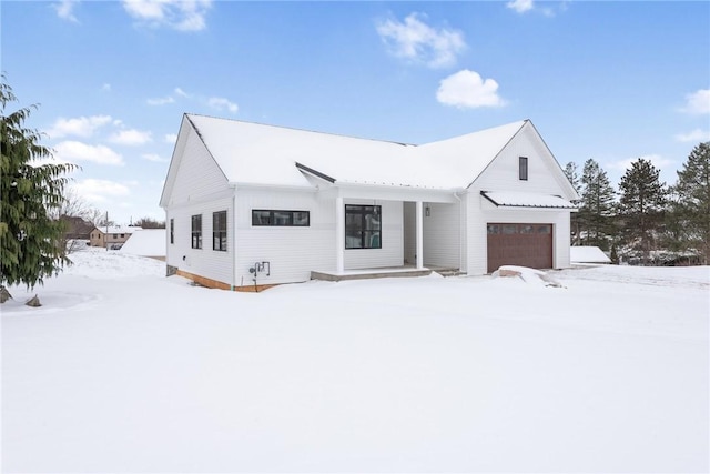 modern farmhouse with a garage