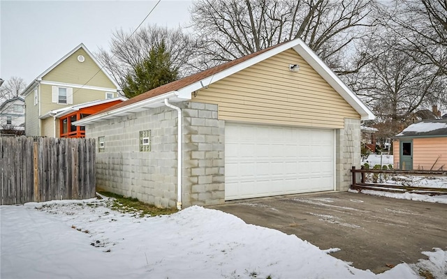 view of snow covered garage