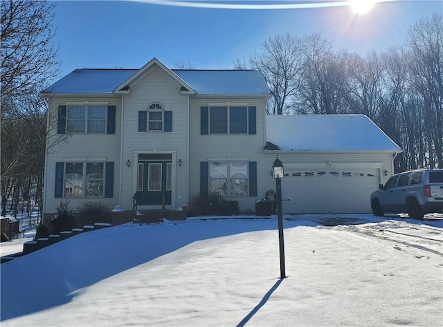 view of front of home with a garage