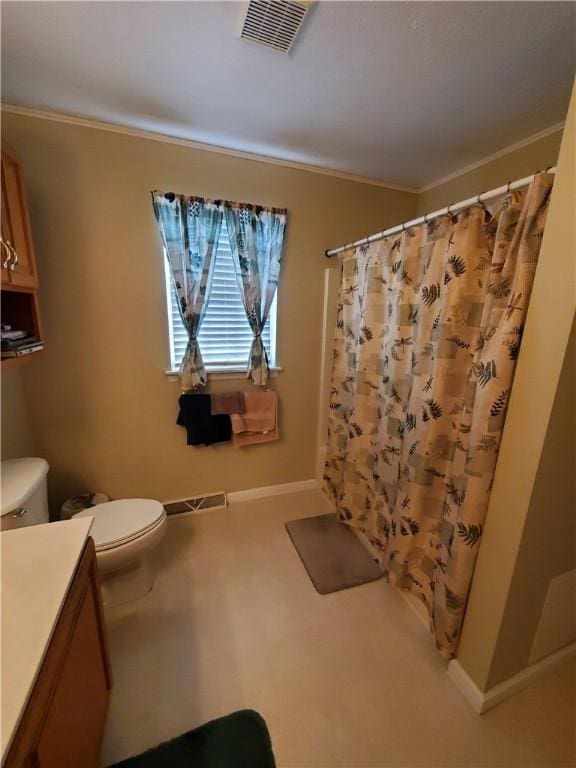 bathroom with vanity, toilet, walk in shower, and crown molding