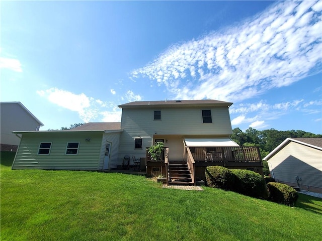 207 October Dr, Twp Of But Se, PA 16002 - rear view of house featuring a deck and a lawn