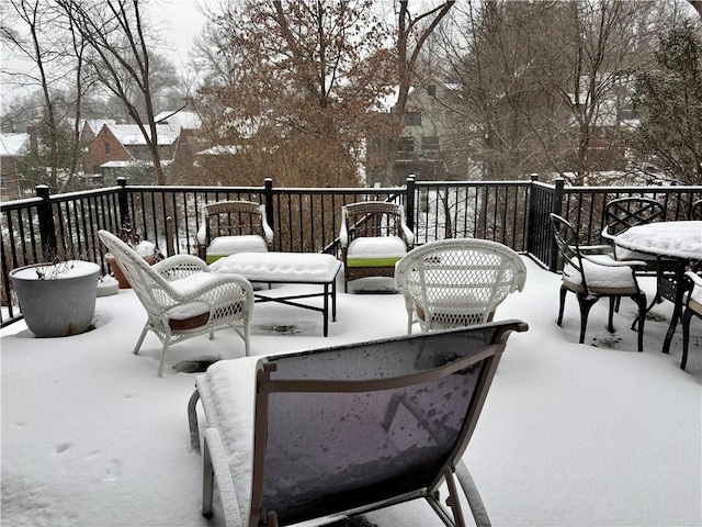 view of snow covered patio