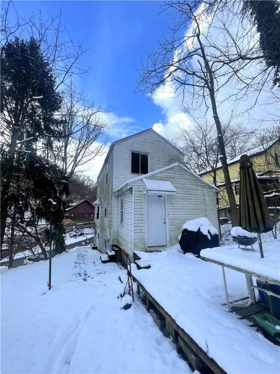 view of snow covered property