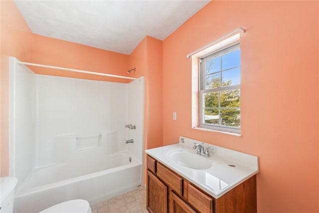 full bathroom featuring bathtub / shower combination, vanity, and toilet