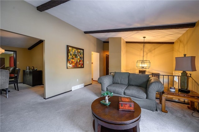 carpeted living room with vaulted ceiling with beams and an inviting chandelier