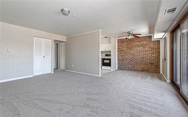 unfurnished living room with light carpet and ceiling fan