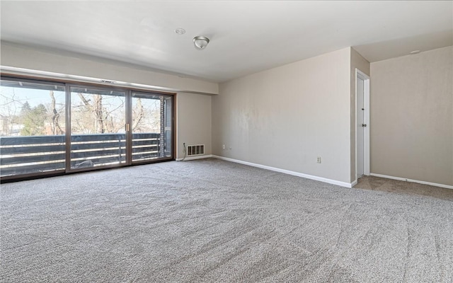 unfurnished room with carpet floors