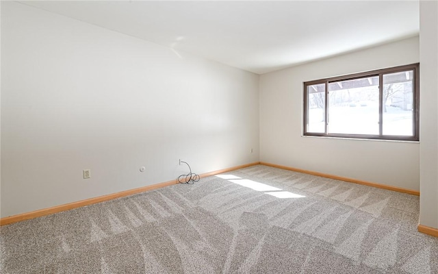 unfurnished room with carpet flooring