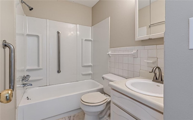 full bathroom with shower / tub combination, vanity, toilet, and tile walls