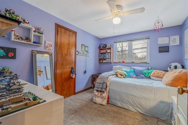 carpeted bedroom featuring ceiling fan