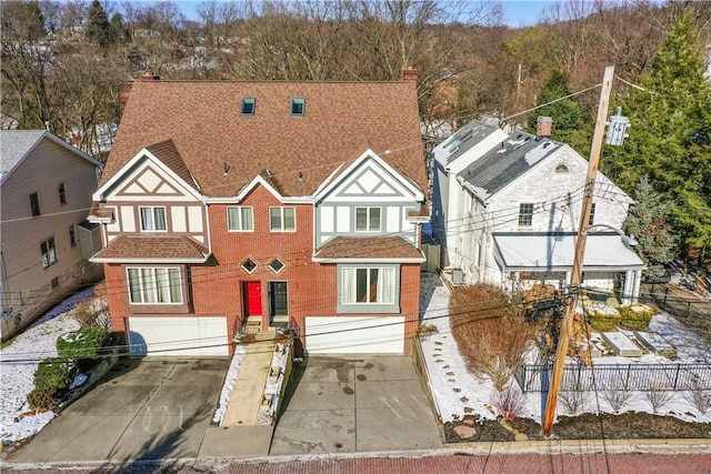 view of front of property with a garage