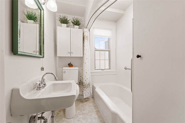 bathroom with toilet and sink