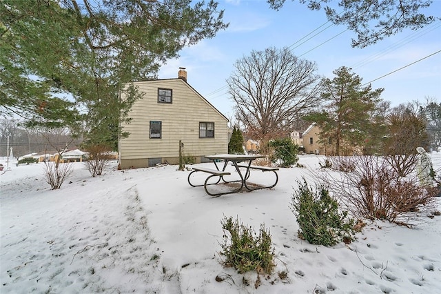 view of snow covered property