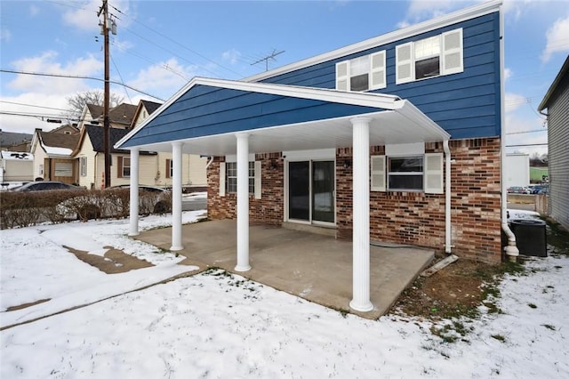 view of snow covered property