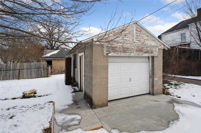 view of snow covered garage