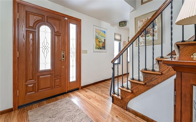 foyer with light wood-type flooring