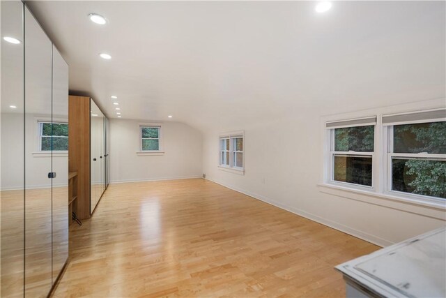 unfurnished living room with light wood-type flooring