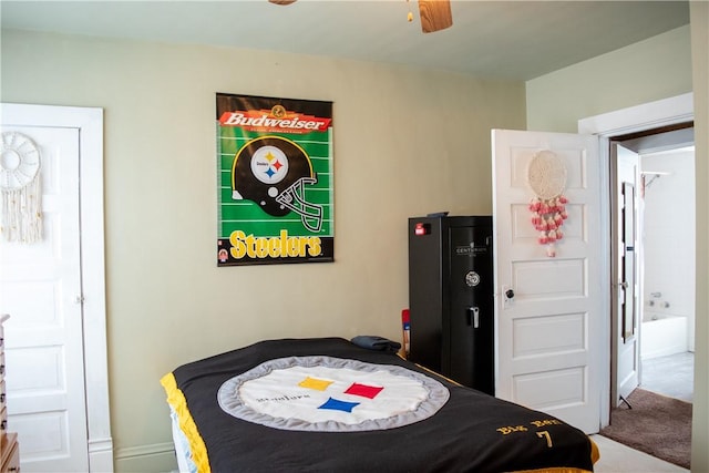 carpeted bedroom featuring ceiling fan