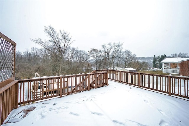 view of snow covered deck