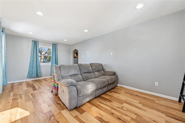 living room with light hardwood / wood-style floors