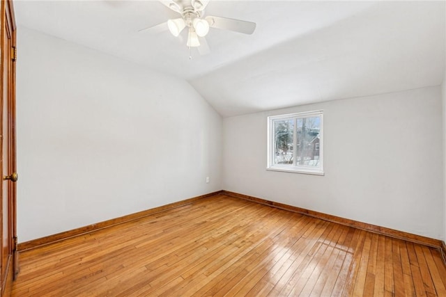 bonus room with light hardwood / wood-style floors, ceiling fan, and lofted ceiling