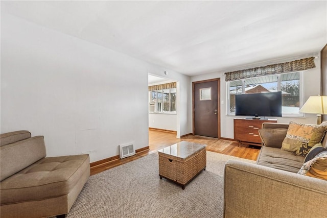 living room featuring light wood-type flooring