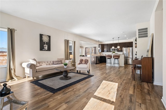 living room featuring wood-type flooring