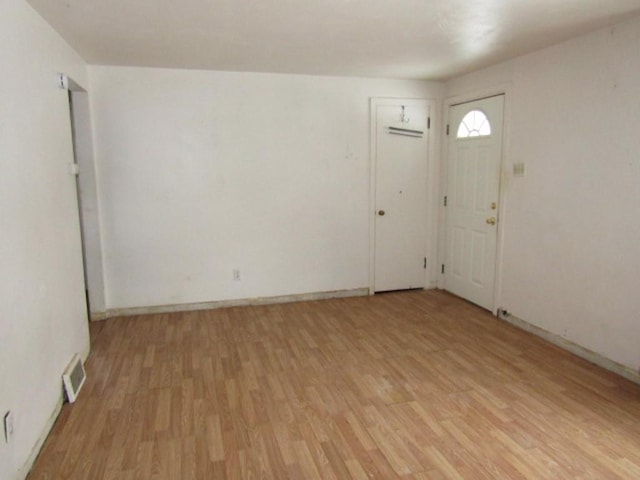 foyer entrance featuring light hardwood / wood-style floors