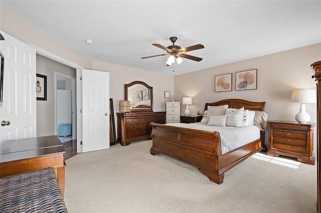 carpeted bedroom featuring ceiling fan