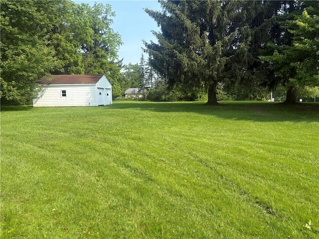 3821-3841 Evergreen Rd, Pulaski Twp Law, PA 16140 - view of green lawn featuring an outdoor structure